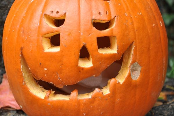 A jack o'lantern with a crooked smile.